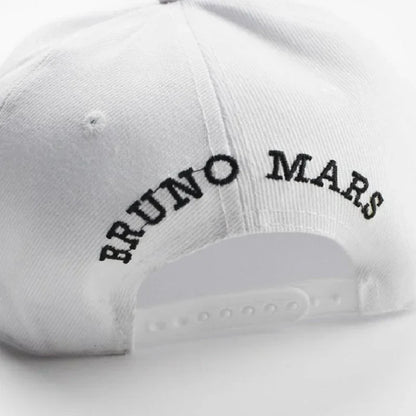 White unisex bruno mars cotton bone rapper xxiv dad hat with black embroidered text on the back side