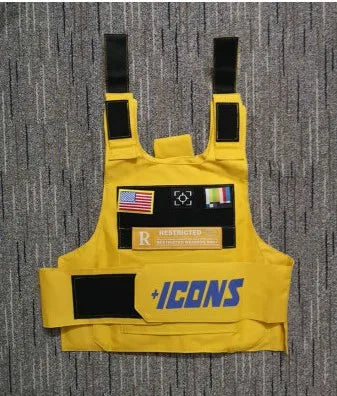 Yellow tactical vest with black straps and patches featuring american italian flags and restricted label for street fashion