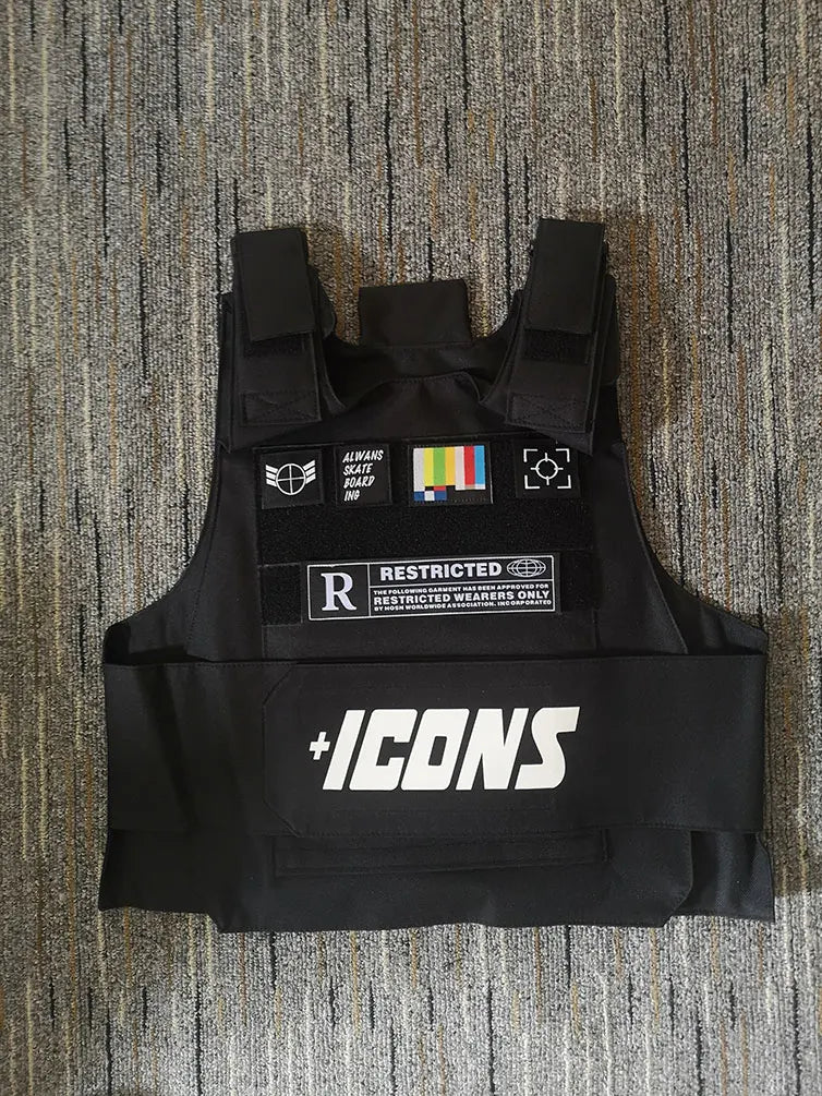 Black tactical vest with white plus icons branding and patches including a restricted label for street fashion use