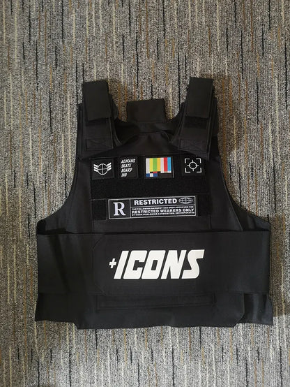 Black tactical vest with white plus icons branding and patches including a restricted label for street fashion use