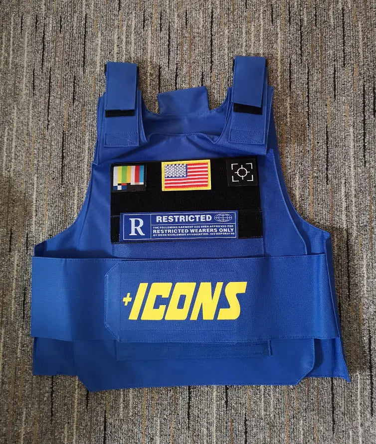 Blue tactical vest with yellow plus icons logo american flag patch and black patches in 2022 rapper hiphop style