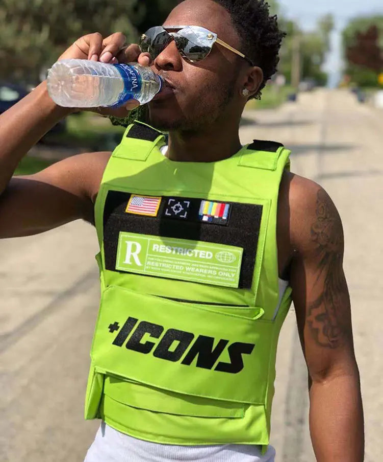 Neon green tactical vest with black patches and bold plus icons branding for 2022 hiphop street fashion use