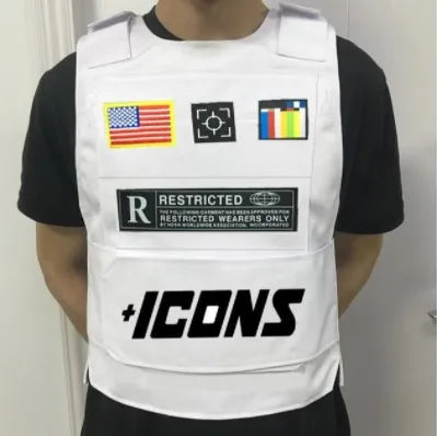 White tactical vest with embroidered patches and bold black plus icons lettering for 2022 rapper hiphop fashion
