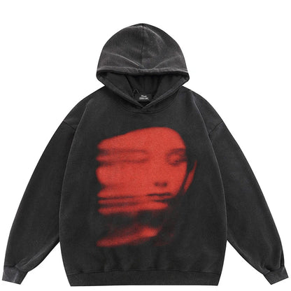 Black oversized hip hop hoodie with faded red blurred face graphic on chest retro washed cotton streetwear pullover