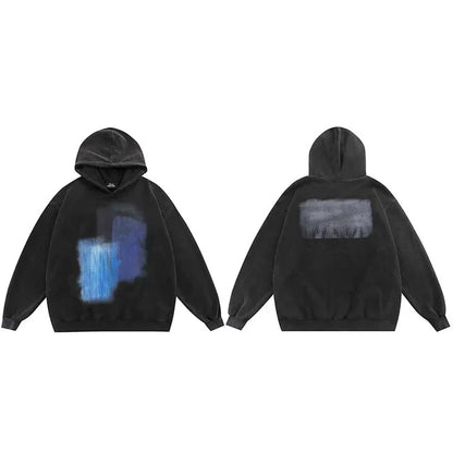 Black oversized hip hop hoodie with faded blue gray abstract graphic front and matching design on back for streetwear