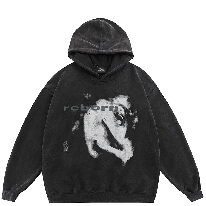 Black hooded pullover sweatshirt with distressed white face graphic and reborn text in hip hop streetwear style