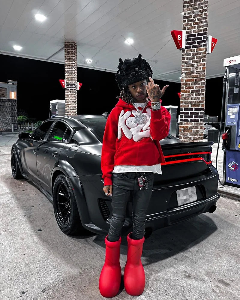 Black matte dodge charger with red accent stripes alongside y2k harajuku street alphabet foaming hoodie for spring american hip style