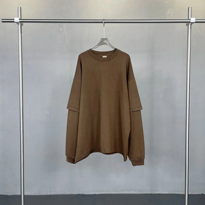 A cozy oversized brown hip hop retro long sleeve sweatshirt with ribbed cuffs for men washing streetwear baggy tshirts y2k