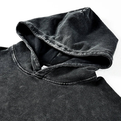 Black denim hoodie with faded distressed texture and reinforced stitching ideal for 2024 winter men’s hip hop sportswear