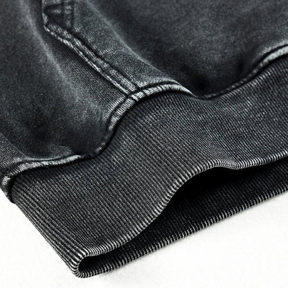 Black denim jacket with ribbed cuffs and visible stitching featured as part of 2024 winter mens sportswear collection