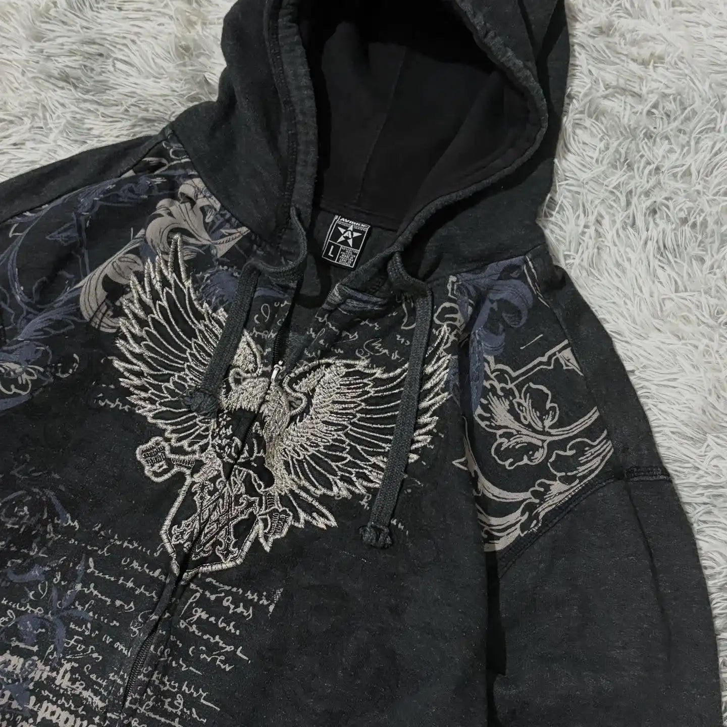 Black zip-up hoodie with large white embroidered eagle and ornate silver-gray patterns in fashion oversized pattern style sweater men y2k