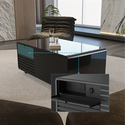 Modern black glossy smart coffee table with sleek design, multifunction music speaker, charging mini refrigerator, and power outlets