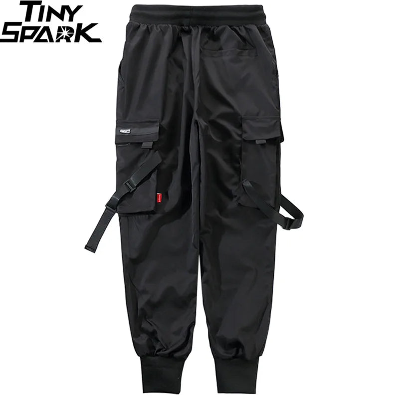 Black cargo pants pockets with adjustable straps from tiny spark featuring men streetwear harajuku swag ribbion harem design