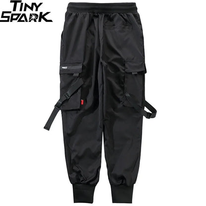 Black cargo pants pockets with adjustable straps from tiny spark featuring men streetwear harajuku swag ribbion harem design