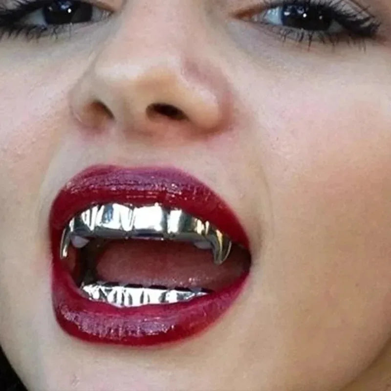 Shiny silver metal hip hop tooth grillz with pointed edges worn over red lipstick for women parties halloween costume rapper accessories