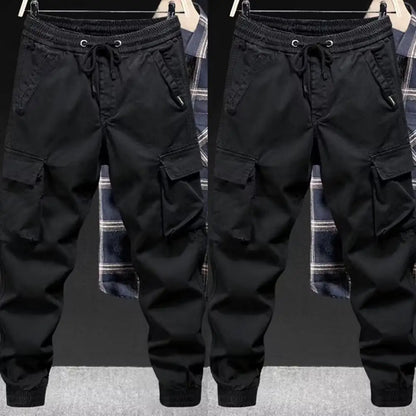 Black men cargo pants with elastic waistband drawstring multiple pockets tapered legs streetwear hip hop style