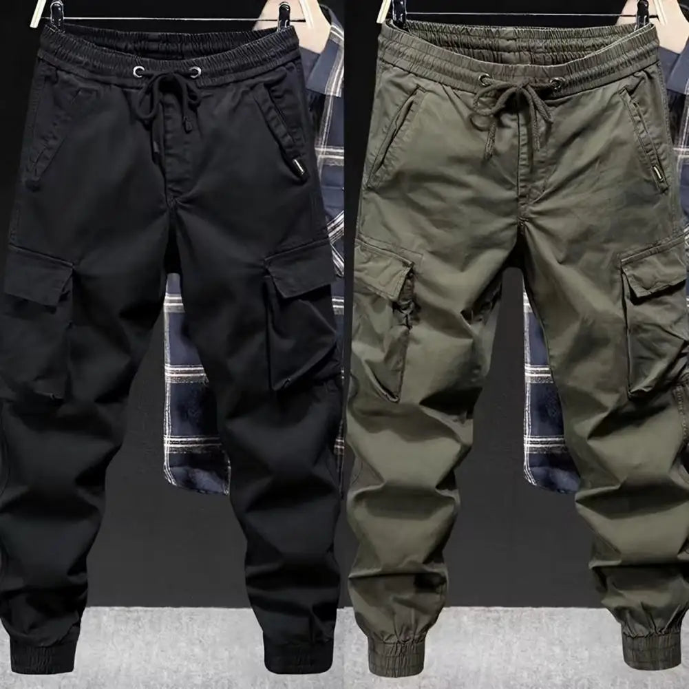 Black and olive green men cargo pants drawstring with elastic waistband multiple pockets and tapered cuffs for streetwear hip hop