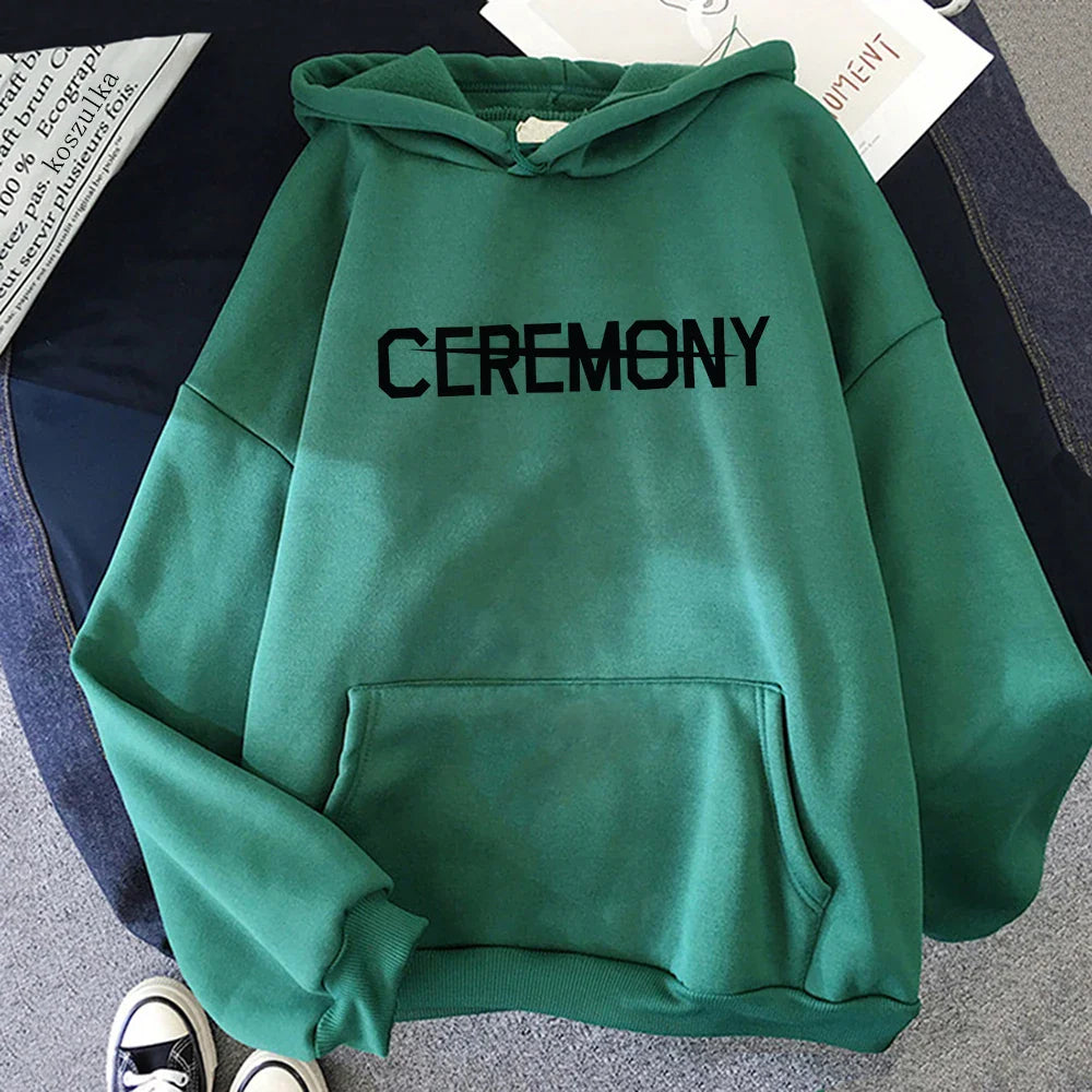 Green hooded sweatshirt with black ceremony lettering across the chest album karma hoodie for autumn winter wear