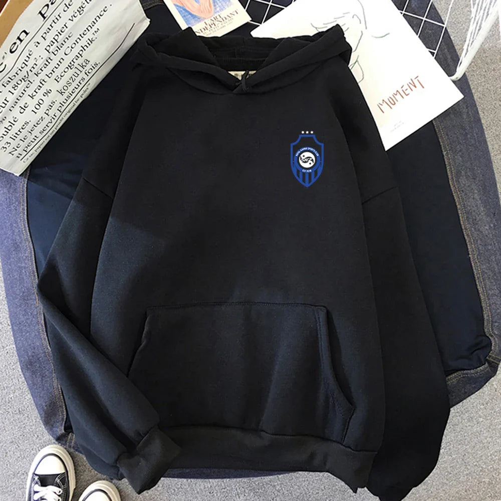 Black album karma hoodie with blue shield logo and front pocket perfect for hoodies autumn winter wear