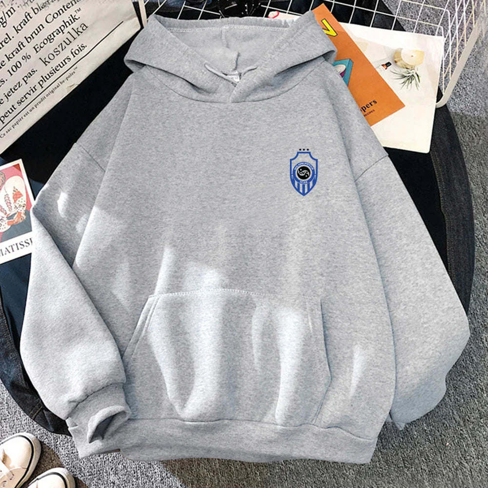 A gray hooded sweatshirt featuring a blue and white shield emblem perfect for album karma hoodie and hoodies autumn winter styles