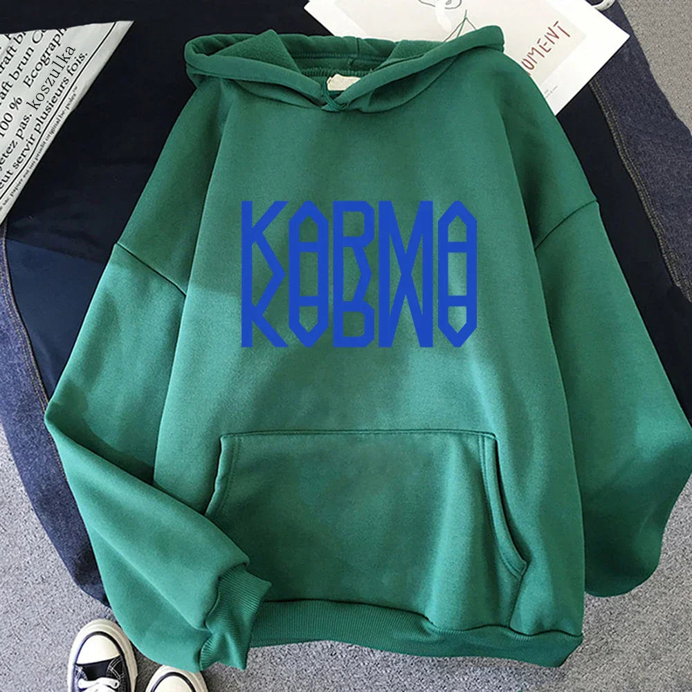 Green hoodie with bold blue kobmo lettering across the chest perfect for album karma hoodie and hoodies autumn winter