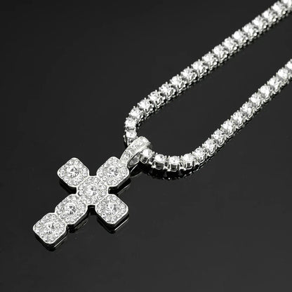 A sparkling silver hip hop cross pendant necklace men with clear crystals on a sleek tennis chain iced design