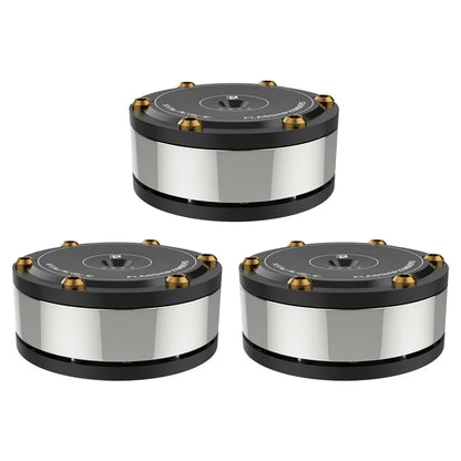 Three black and silver cylindrical speakers with gold-colored screws featuring audiophile shock damping amplifier spike stand and stand hifi isolation feet