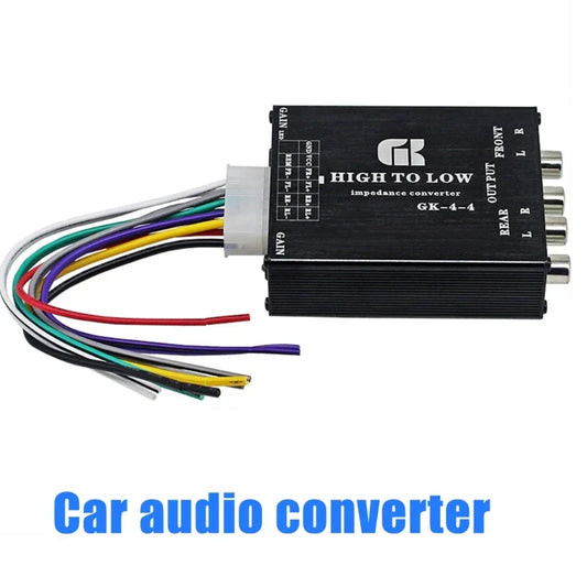 Black rectangular multifunction sound converter with silver rca connectors and multicolored wires for recording studios at beat music store