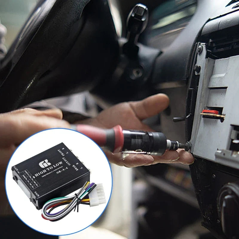 Black rectangular multifunction sound converter with labeled input output ports and color-coded wiring for recording studios in beat music store