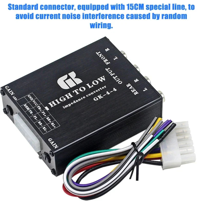 Black rectangular gk-4-4 multifunction sound converter with silver audio connectors and colored wires for recording studios
