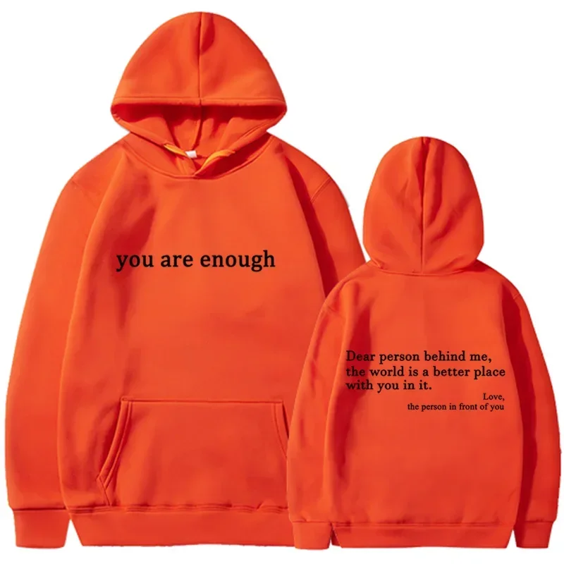Bright orange pullover retro hoodie with black text on front and back designed for hip hop unisex street style