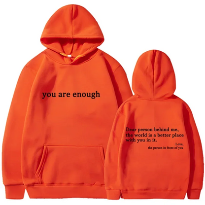 Bright orange pullover retro hoodie with black text on front and back designed for hip hop unisex street style