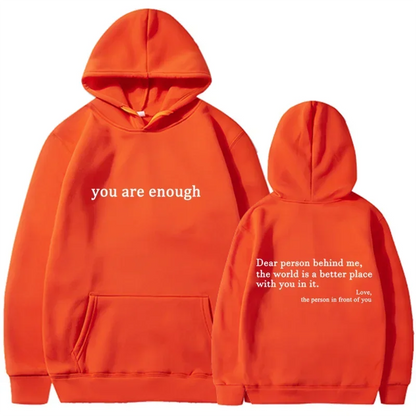 Bright orange pullover retro hoodie with white text, cozy hood, and kangaroo pocket for hip hop unisex streetwear