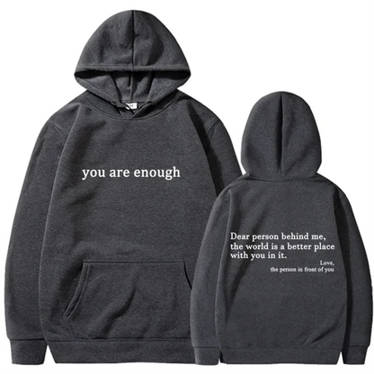 Dark gray pullover retro hoodie with white text on front and back designed as a hip hop unisex street style top