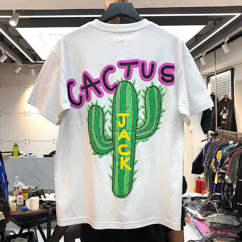 White cotton hip hop t shirt with vibrant green cactus graphic and bold purple cactus lettering for streetwear style
