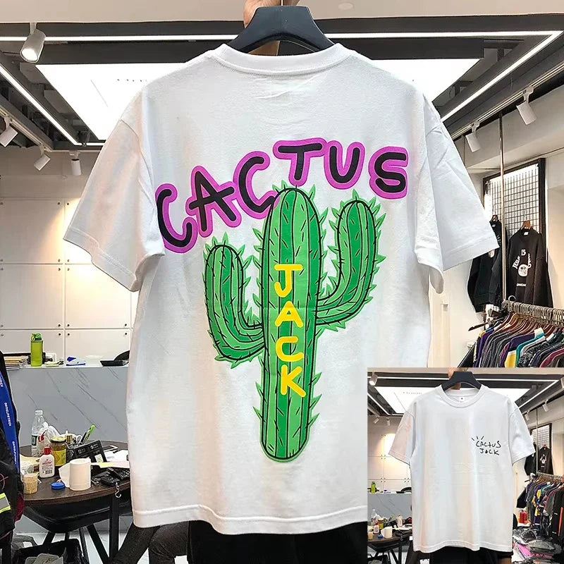 White cotton hip hop t shirt with vibrant green cactus graphic and bold pink and yellow cactus jack lettering streetwear