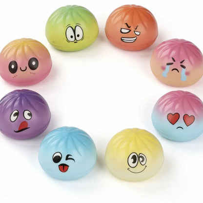 Colorful gradient-finish baozi-shaped stress balls with cartoon faces for decompression and stress relief play