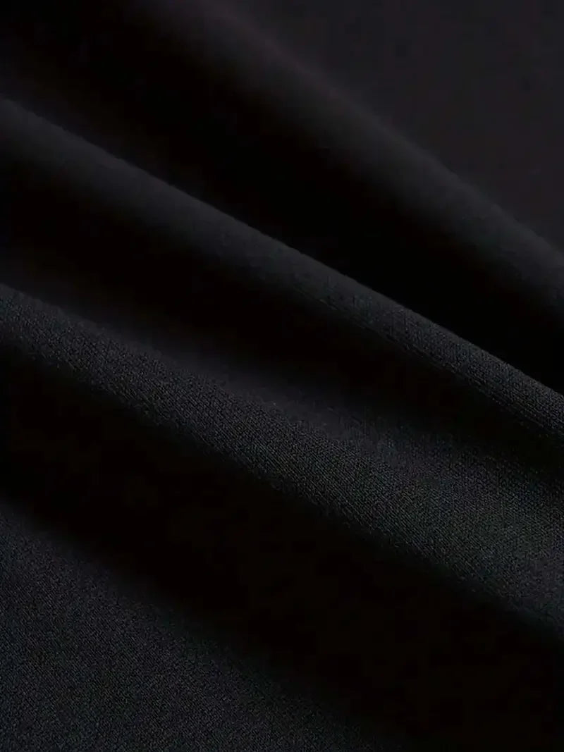 Black satin fabric with smooth glossy finish on the rapper retro graphic t-shirt xxxtentacion y2k unisex t-shirt