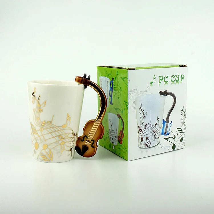 White ceramic 240ml creative music mug with golden violin handle and gold musical notes for coffee tea milk use