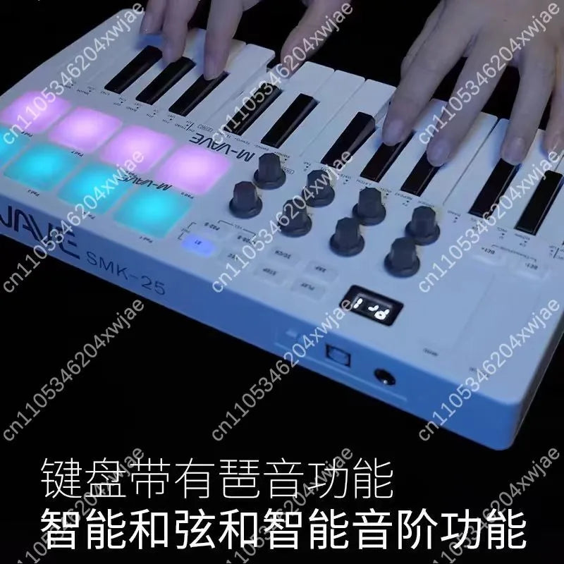 White m-audio smk-25 midi keyboard controller with illuminated purple and blue drum pads wireless for music production