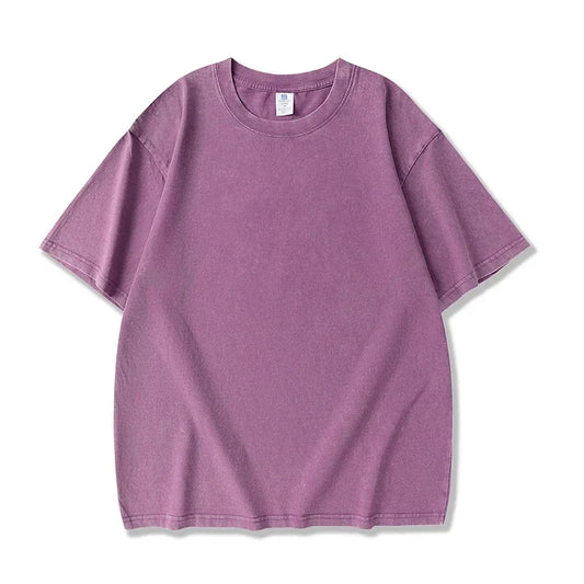 A soft lavender oversized cotton t-shirt with a relaxed fit and crew neck in hip hop retro acid wash tops style for shirt women harajuku