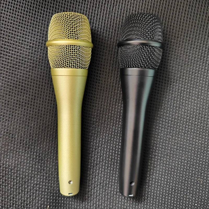 Two handheld ksm9 professional karaoke microphones with gold metallic and matte black finishes for clear sound stage performance