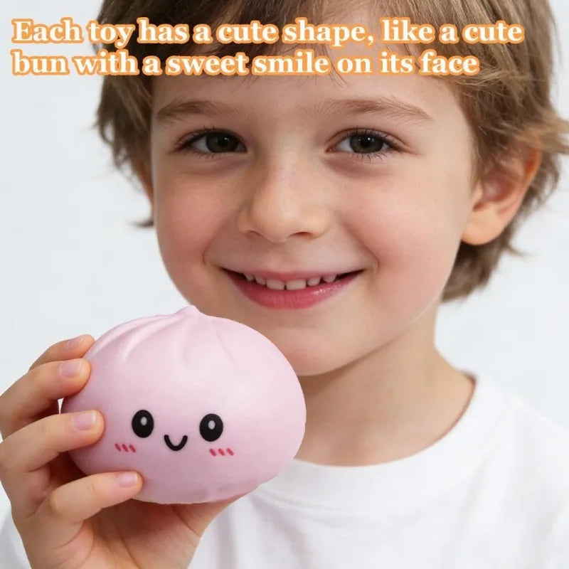 Pink squishy large baozi toy shaped like a cute bun with a sweet smile for kneading music decompression simulation