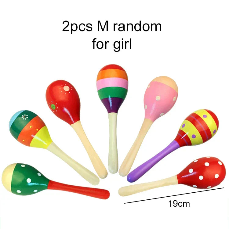 Colorful wooden maracas with painted patterns and handles designed as children orff instruments for montessori games tmz
