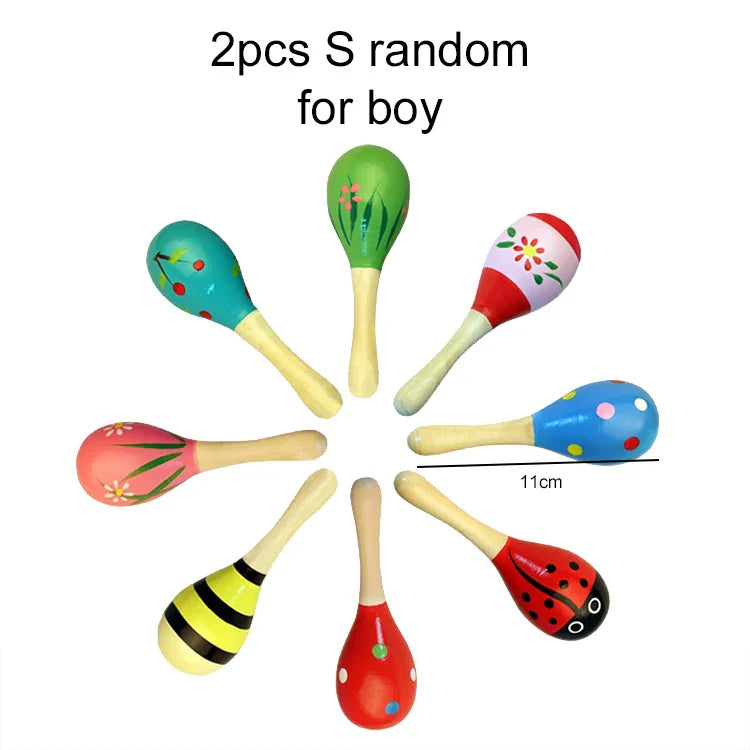 Colorful wooden maracas with painted designs like flowers and ladybugs musical instrument children orff instruments