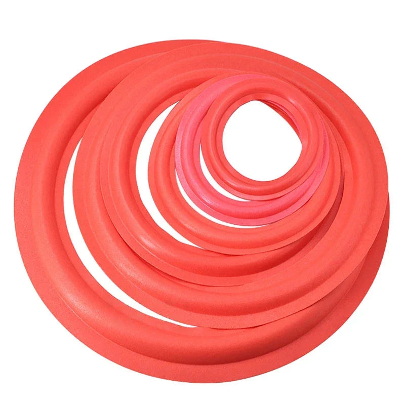 A set of vibrant coral rubber ring edge speaker repair parts coiled for speaker surround repair in multiple sizes