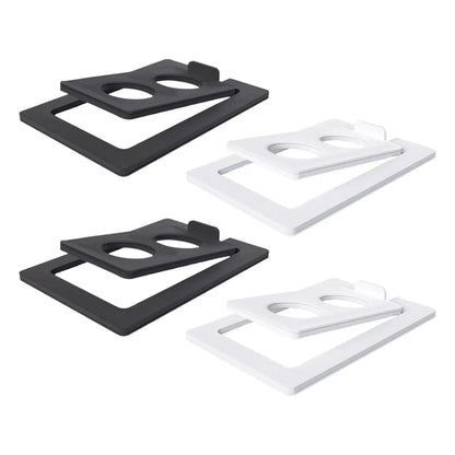 Black and white plastic 2pcs tilted desktop speaker stands with circular cutouts for studio speakers and small speakers