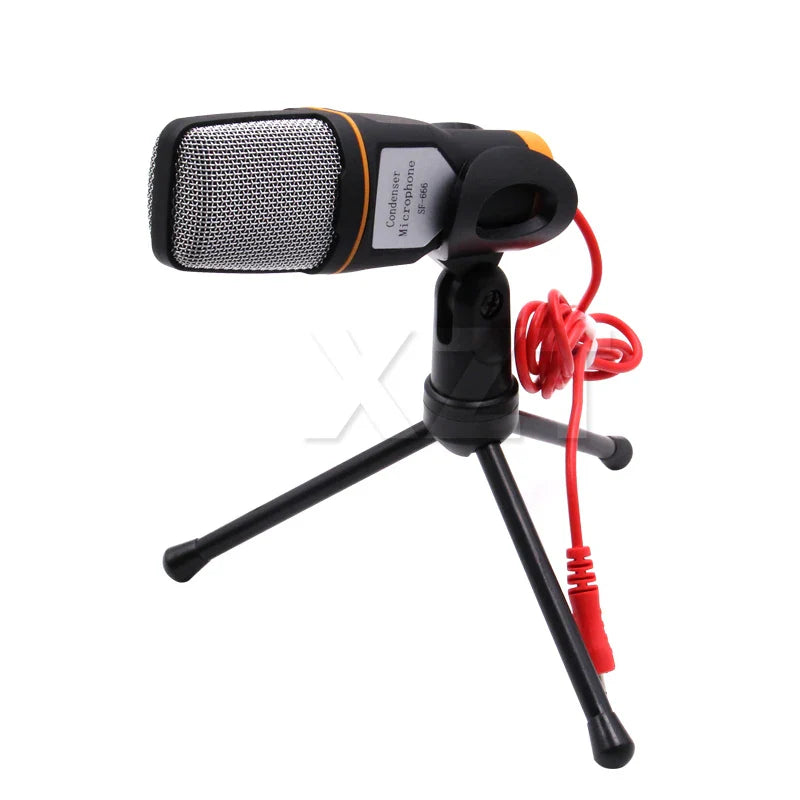 Black and orange 3.5mm wired stereo condenser microphone with silver mesh grille on black tripod stand for pc chatting singing