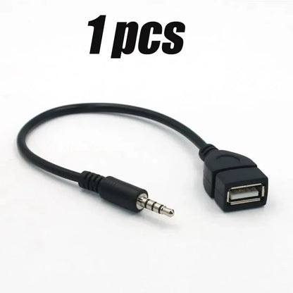 Black usb audio cable with 3.5mm aux connector and metallic tips for cable car electronics and car audio use