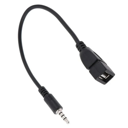 Black car aux usb audio cable with compact molded plastic housing and metallic contacts for cable car electronics use